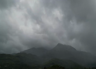 Aerial View of Fog Covered Mountains in Wayanad Kerala India