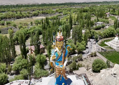 Aerial View of Guru Padmasambhava Statue and Himalayan Landscape in Ladakh India