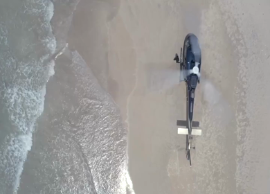 Aerial View of Helicopter on Sandy Beach Sri Lanka