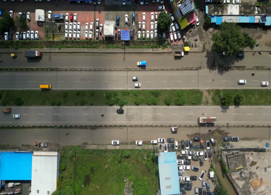 Aerial View of Highway Traffic and Green Agricultural Fields in Bhopal
