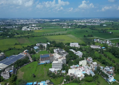 Aerial View of Highway Traffic and Green Agricultural Fields in Bhopal