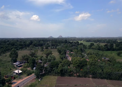 Aerial View of Hiriwadunna Lake with Sigiriya and Pidurangala Rocks Sri Lanka