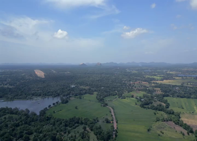 Aerial View of Hiriwadunna Lake with Sigiriya and Pidurangala Rocks Sri Lanka