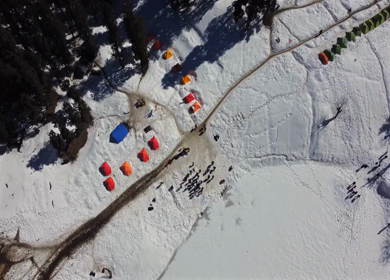 Aerial View of Kedarkantha Winter Trek with Snow Covered Mountains Uttarakhand