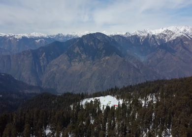 Aerial View of Kedarkantha Winter Trek with Snow Covered Mountains Uttarakhand