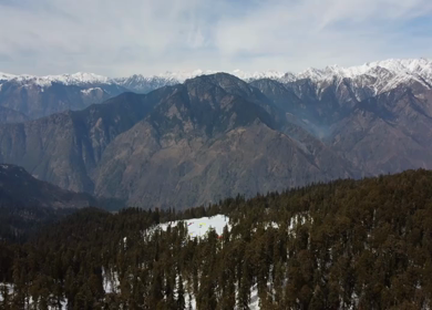 Aerial View of Kedarkantha Winter Trek with Snow Covered Mountains Uttarakhand
