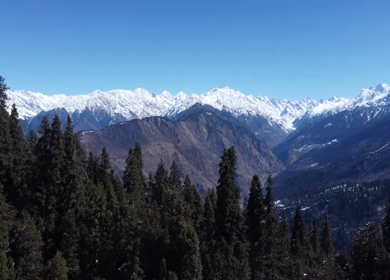 Aerial View of Kedarkantha Winter Trek with Snow Covered Mountains Uttarakhand