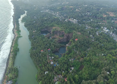 Aerial View of Kerala Coastline Backwaters and Rocky Quarry Landscape Malappuram India