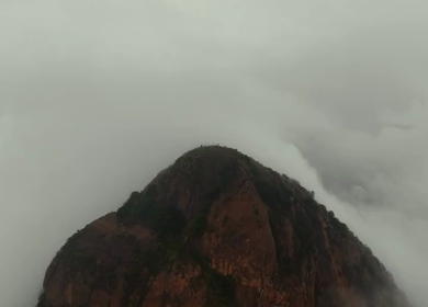 Aerial View of Kondarangi Hills with Rocky Peak and Clouds in Dindigul Tamil Nadu