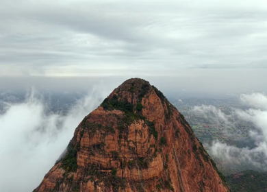 Aerial View of Kondarangi Hills with Rocky Peak and Clouds in Dindigul Tamil Nadu