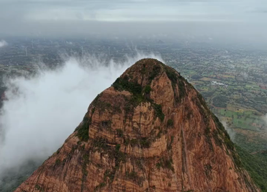 Aerial View of Kondarangi Hills with Rocky Peak and Clouds in Dindigul Tamil Nadu