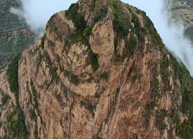 Aerial View of Kondarangi Hills with Rocky Peak and Clouds in Dindigul Tamil Nadu