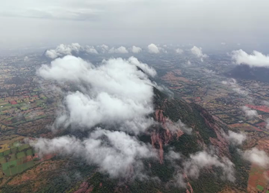 Aerial View of Kondarangi Hills with Rocky Peak and Clouds in Dindigul Tamil Nadu