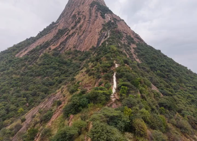 Aerial View of Kondarangi Hills with Rocky Peak and Clouds in Dindigul Tamil Nadu