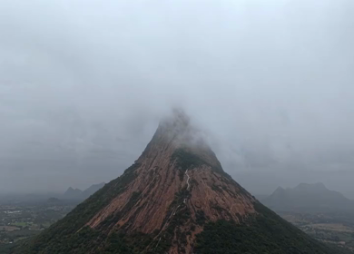 Aerial View of Kondarangi Hills with Rocky Peak and Clouds in Dindigul Tamil Nadu
