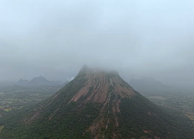 Aerial View of Kondarangi Hills with Rocky Peak and Clouds in Dindigul Tamil Nadu