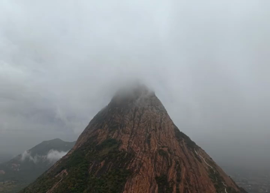 Aerial View of Kondarangi Hills with Rocky Peak and Clouds in Dindigul Tamil Nadu
