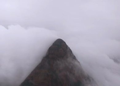 Aerial View of Kondarangi Hills with Rocky Peak and Clouds in Dindigul Tamil Nadu