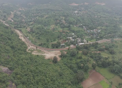 Aerial View of Kottavalasa–Kirandul Railway Line Through Lush Green Hills and Rural Villages, Andhra Pradesh