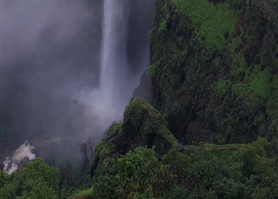 Aerial View of Kumbhe Waterfall and Misty Cliffs Maharashtra