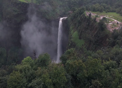Aerial View of Kumbhe Waterfall and Misty Cliffs Maharashtra