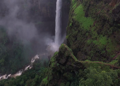Aerial View of Kumbhe Waterfall and Misty Cliffs Maharashtra