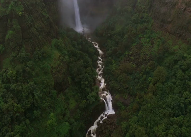Aerial View of Kumbhe Waterfall and Misty Cliffs Maharashtra