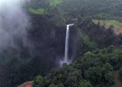 Aerial View of Kumbhe Waterfall and Misty Cliffs Maharashtra