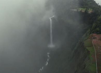 Aerial View of Kumbhe Waterfall and Misty Cliffs Maharashtra
