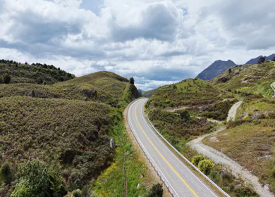 Aerial View of Lake Wanaka and Scenic Mountain Road in Otago New Zealand