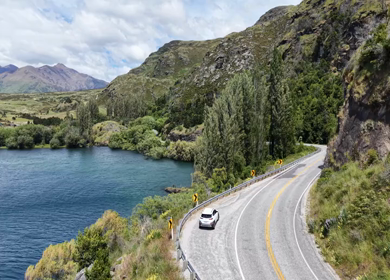Aerial View of Lake Wanaka and Scenic Mountain Road in Otago New Zealand