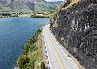 Aerial View of Lake Wanaka and Scenic Mountain Road in Otago New Zealand
