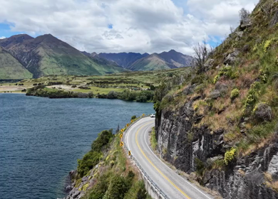 Aerial View of Lake Wanaka and Scenic Mountain Road in Otago New Zealand