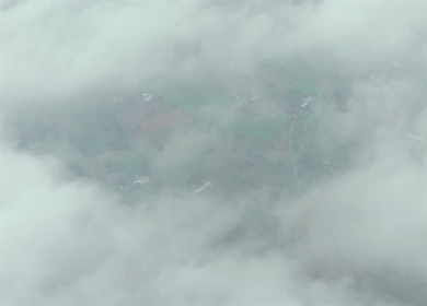 Aerial View of Low Clouds Floating Over Rural Landscape in Tamil Nadu India