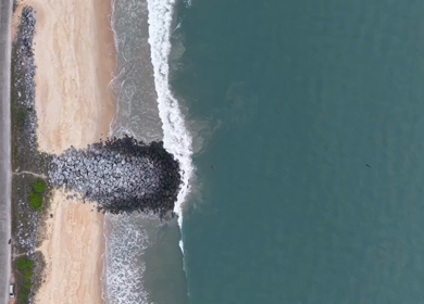 Aerial View of Malpe Beach Coastline and Breakwaters in Udupi Karnataka India