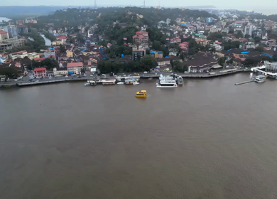 Aerial View of Mandovi River with Ferry and Panaji Cityscape Goa India