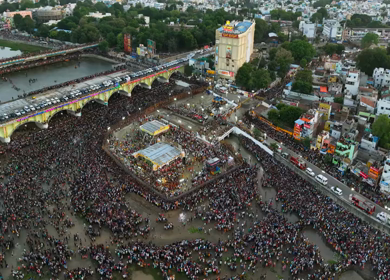 Aerial View of Massive Crowd During Azhagar Festival at Vaigai River Madurai India