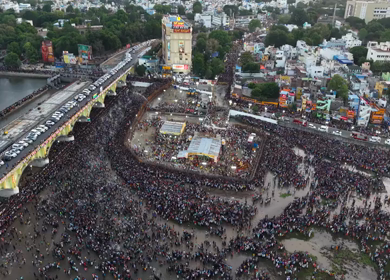 Aerial View of Massive Crowd During Azhagar Festival at Vaigai River Madurai India