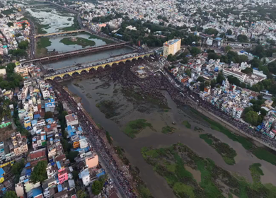 Aerial View of Massive Crowd During Azhagar Festival at Vaigai River Madurai India