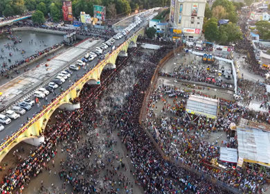 Aerial View of Massive Crowd During Azhagar Festival at Vaigai River Madurai India