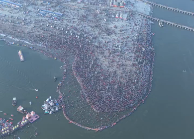 Aerial View of Massive Pilgrim Gathering at the Sacred River Maha Kumbh Mela 2025, Prayagraj