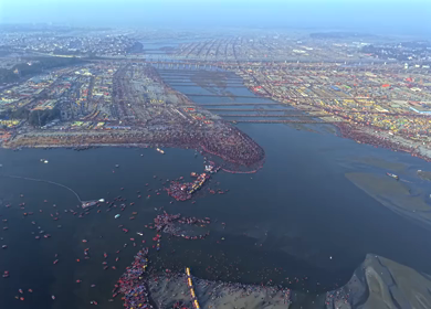 Aerial View of Massive Pilgrim Gathering at the Sacred River Maha Kumbh Mela 2025, Prayagraj