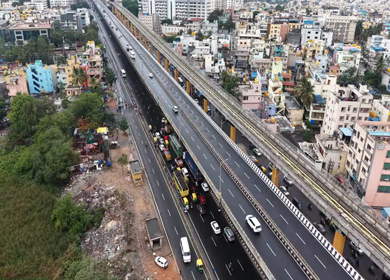 Aerial View of Waterlogged Road and Metro Corridor After Heavy Rain in Bengaluru India