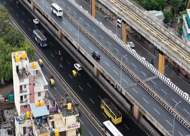Aerial View of Waterlogged Road and Metro Corridor After Heavy Rain in Bengaluru India