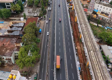 Aerial View of Waterlogged Road and Metro Corridor After Heavy Rain in Bengaluru India