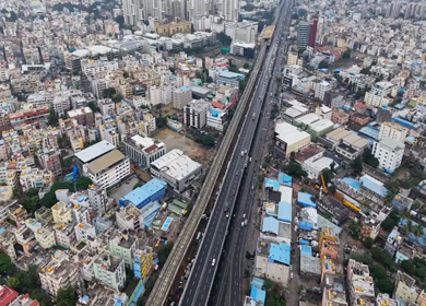 Aerial View of Waterlogged Road and Metro Corridor After Heavy Rain in Bengaluru India