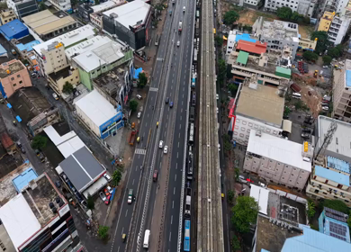 Aerial View of Waterlogged Road and Metro Corridor After Heavy Rain in Bengaluru India