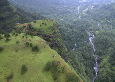 Aerial View of Monsoon Waterfall and Misty Mountains in Maharashtra India