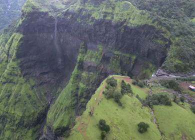 Aerial View of Monsoon Waterfall and Misty Mountains in Maharashtra India