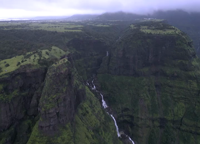 Aerial View of Monsoon Waterfall and Misty Mountains in Maharashtra India